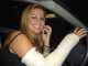 Ane driving a car